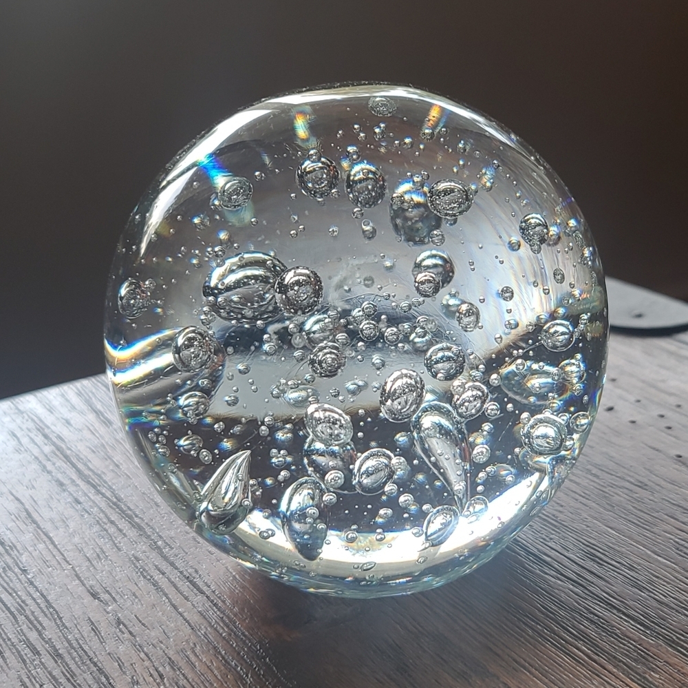 Large clear spherical paperweight with bubbles